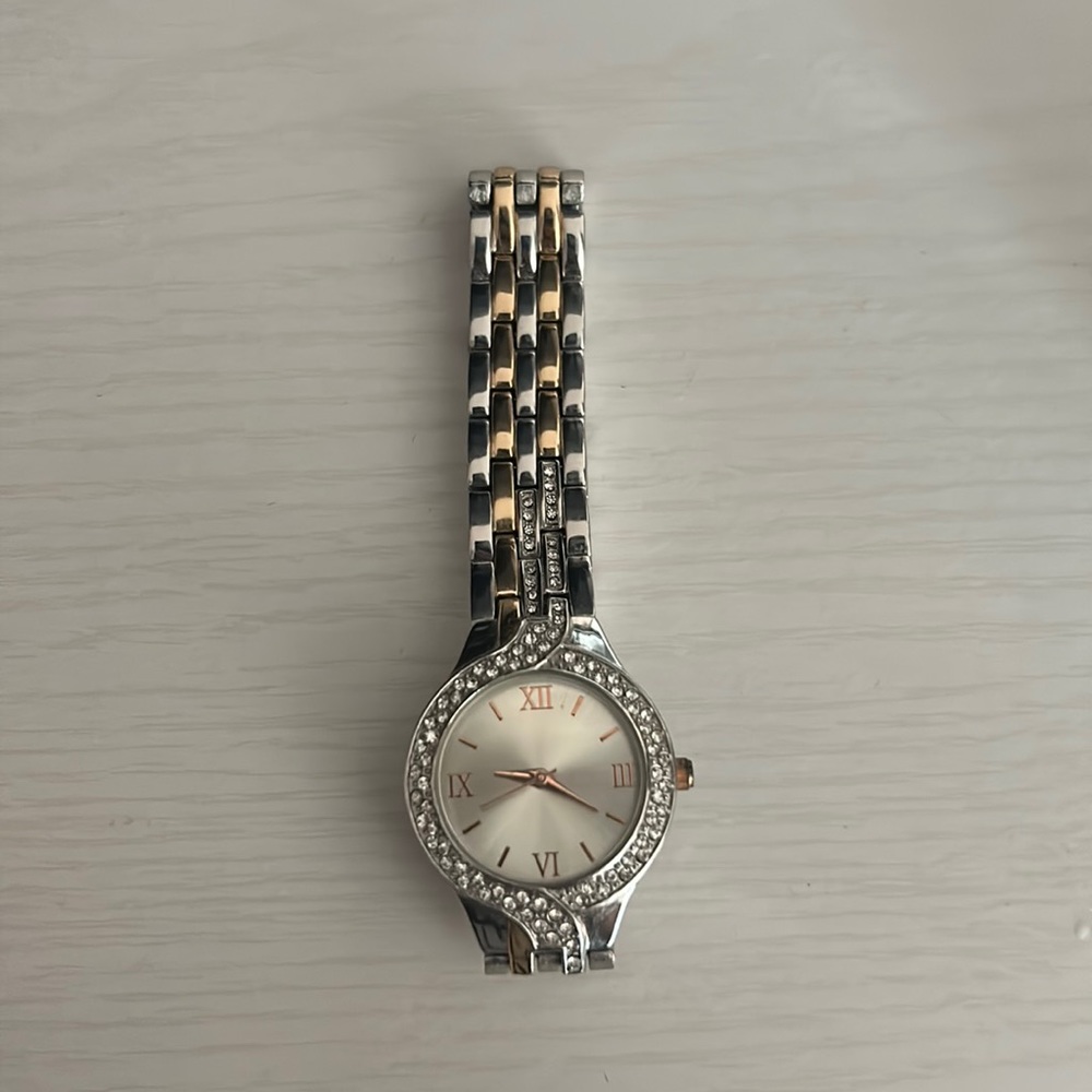 Silver and rose gold watch